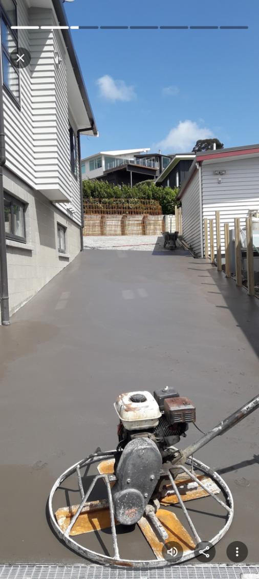 Concrete driveway with coastal sea view at sunset